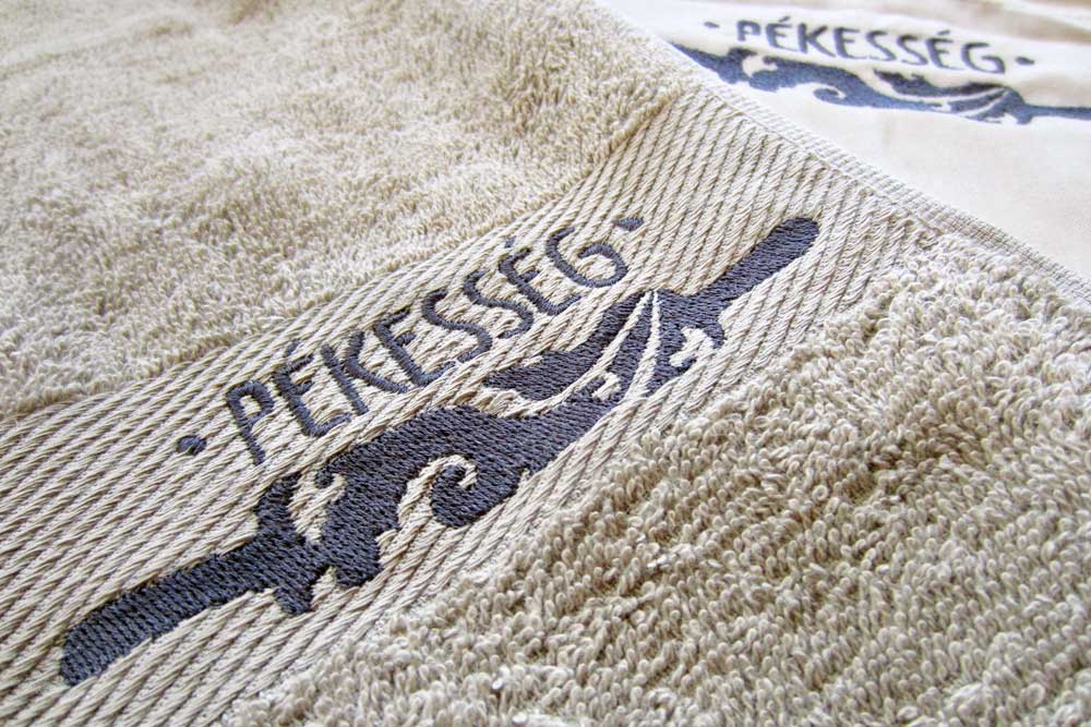 Pékesség, munkaruha, kötény, törölköző